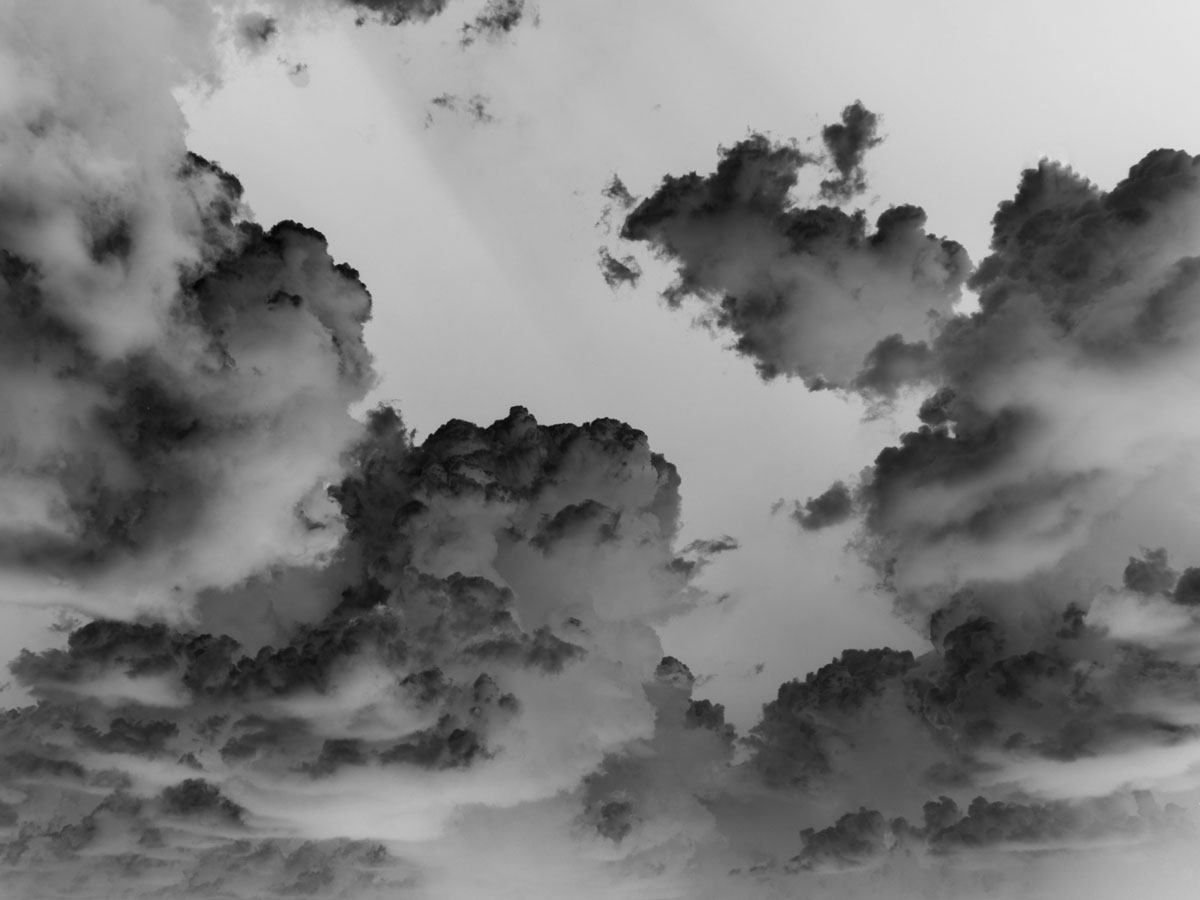 Clouds shown in negative.