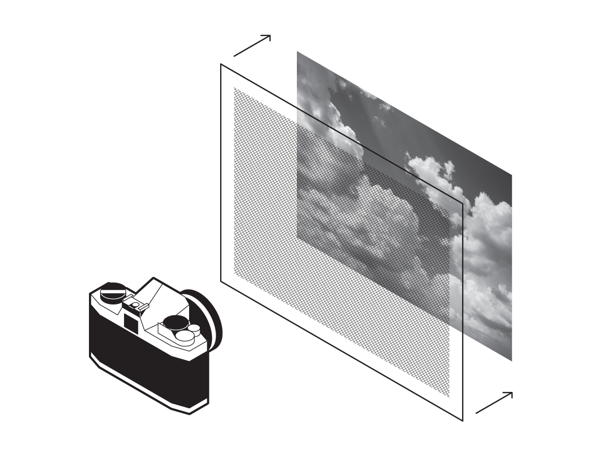 A camera pointed at a photograph of clouds. Between the camera and the photo is a screen with a fine mesh, and arrows pointing from the screen to the photo indicate that the screen will sit directly in front of the photo.